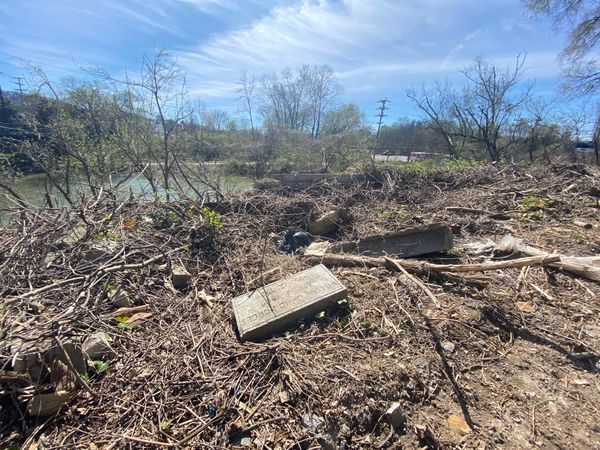 Two Gravestones, One Linked to an Ohio Cemetery, Lie on a Vacant Roanoke Property. Why?