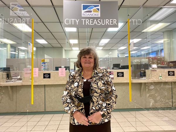 Evelyn Powers on running the city's 'bank,' balancing accounts at her father's grocery store, and the tax collector in the Bible